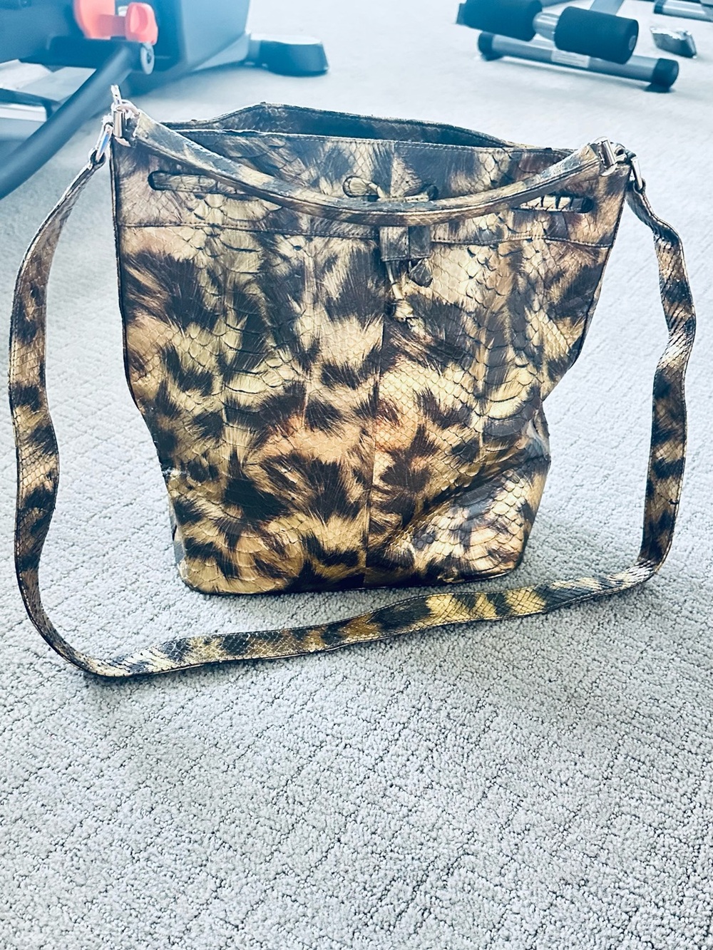 The Barfield Collection Animal Print Snake Embossed Bucket Crossbody Bag